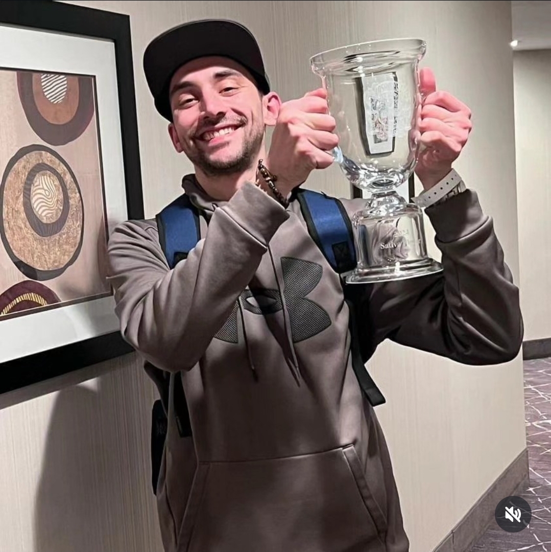 CannaDave raising a Hash Bash Cup trophy from the Bangarang strain championship run